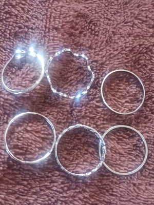 Set of 6 silver rings with different designs
