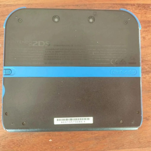 Nintendo 2DS used with stylus and charger
