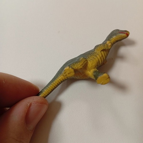 Miniature dinosaur figure like new