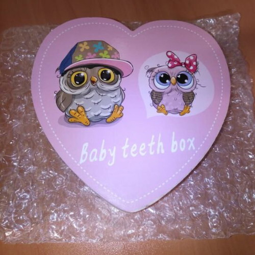 Wooden baby tooth storage boxes with boy and girl designs