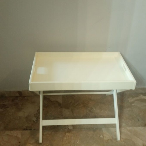 Wooden tray with folding stand used