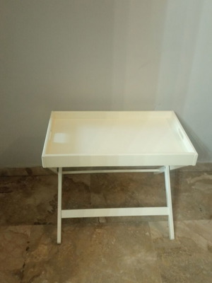 Wooden tray with folding stand used