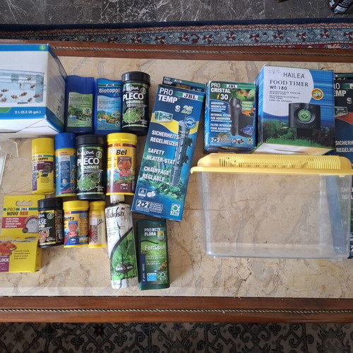 Aquarium equipment and food like new, assorted items pack