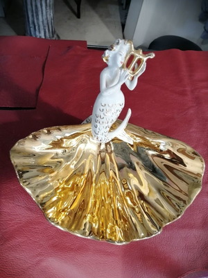 Mermaid and clam used, gold and porcelain decoration