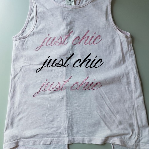 Soft pink sleeveless top like new, 100% cotton, size 14, ages 12-14
