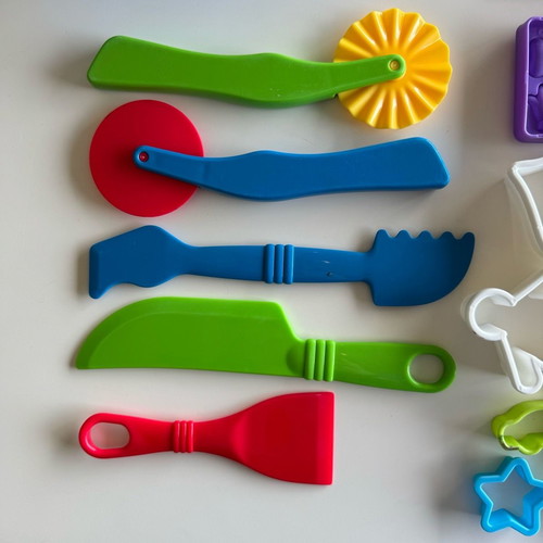 Play Doh Care and Carry Vet Playset used with modeling accessories