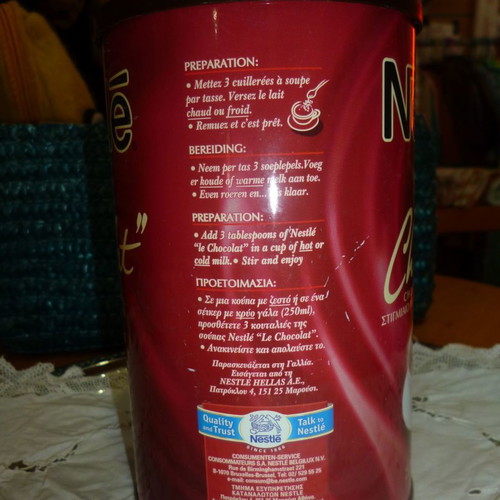 Nestle metal tin used, chocolate powder