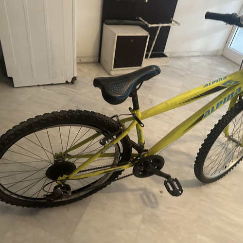 Alpina Yellow Mountain Bike used with 27 inch wheels and V-Brakes