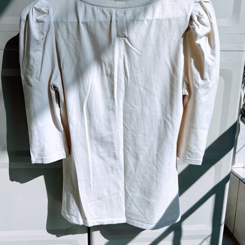 Blouse with black bow and padded sleeves used, size M