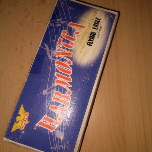 Flying Eagle harmonica like new