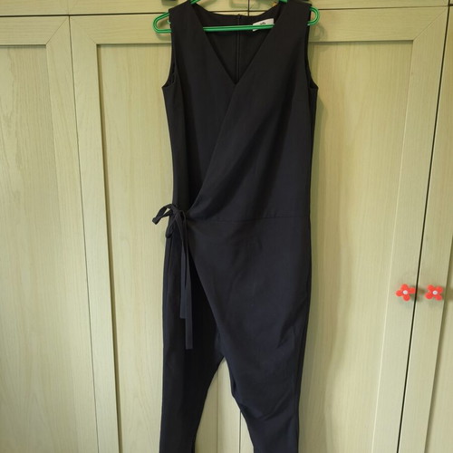 Ixos jumpsuit black sleeveless with salvari pants and wrap tie like new