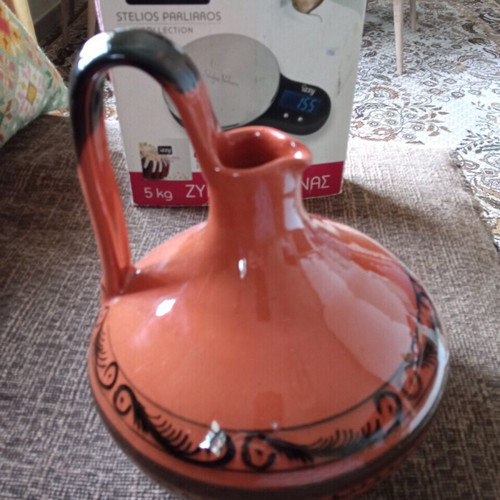 Ceramic wine jug like new with painted border