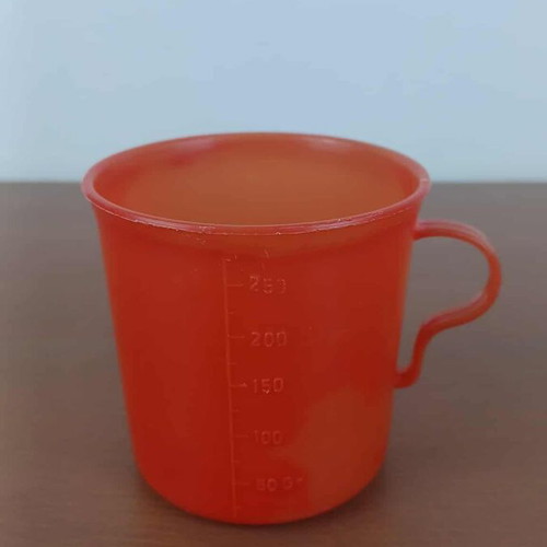 Vintage measuring cup used from Greek BIOTRAK