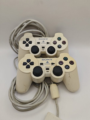 Sony PlayStation 2 controllers ceramic white used, set of 2