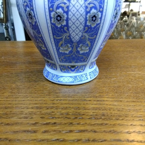 Handmade porcelain vase like new, blue with patterns