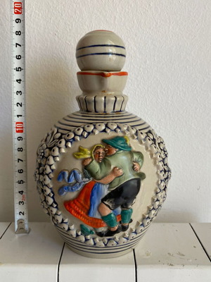 German cider earthenware jug used with relief carving