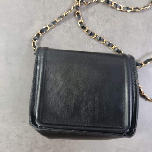 Small black crossbody bag with gold chain like new