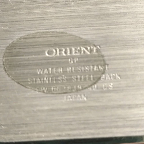 Vintage Orient watch used with leather strap