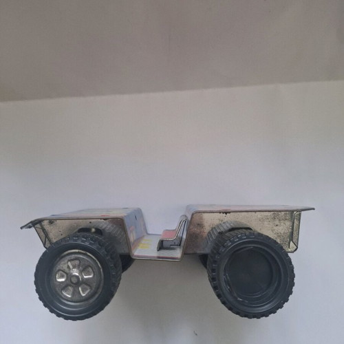 Retro tin buggy toy used with missing parts