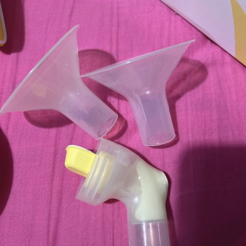 Medela Swing electric breast pump like new with 2-phase technology