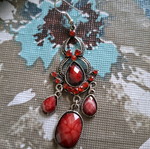 Earring red used, single