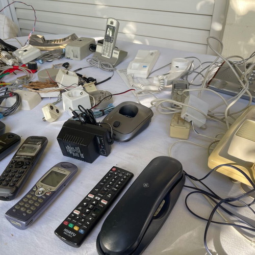 Set of old cables, sockets and telephony devices used