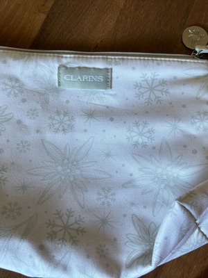 Clarins cosmetic bag, white and grey