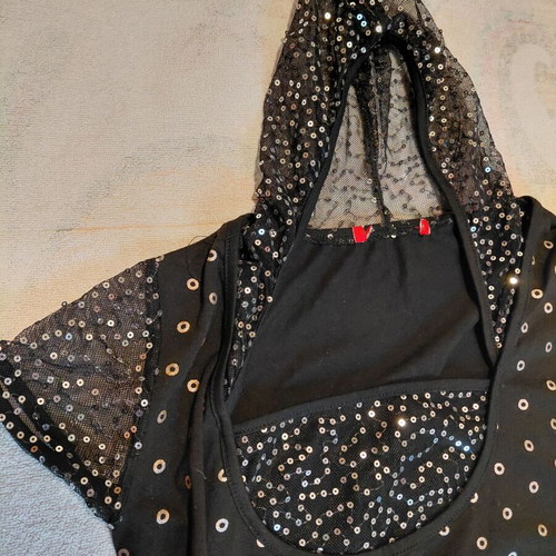 Shiny top black with gold details, like new, size S