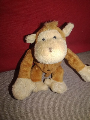 Plush monkey with zipper coin purse