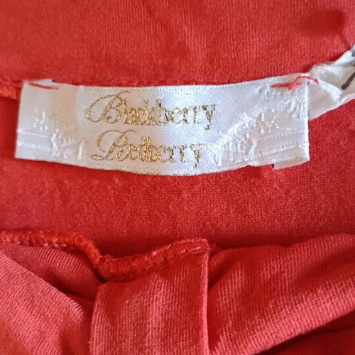 Blackberry Redberry dress used, strapless asymmetric coral