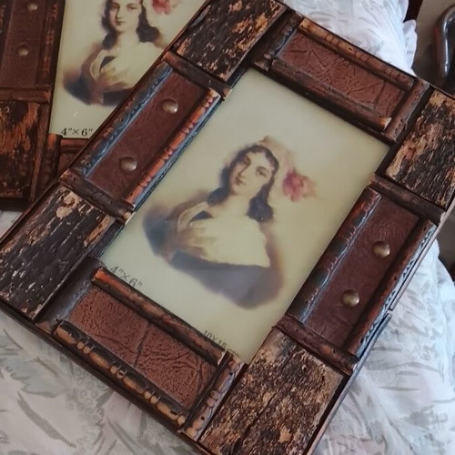 Vintage photo frames with wood, leather and brass