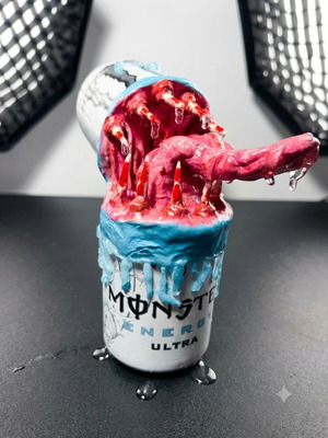 Handmade monster figure from Monster can with clay and UV resin