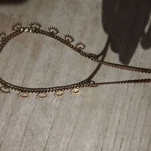 Necklace with evil eyes used, gold color stainless steel