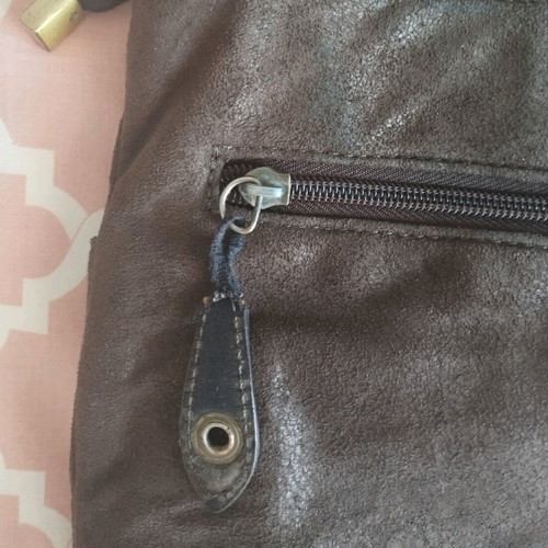 Brown suede crossbody bag used with multiple pockets
