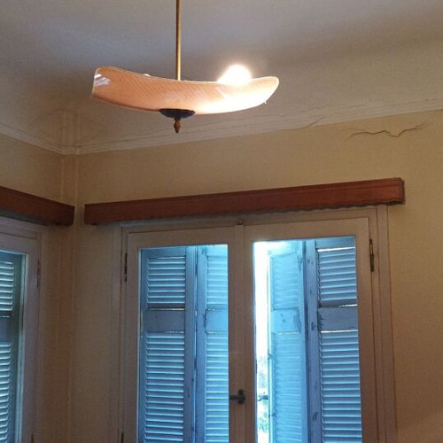 Vintage ceiling light used, soft apricot tones