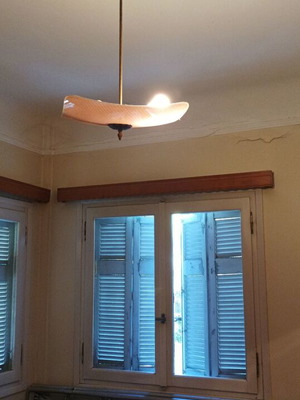 Vintage ceiling light used, soft apricot tones