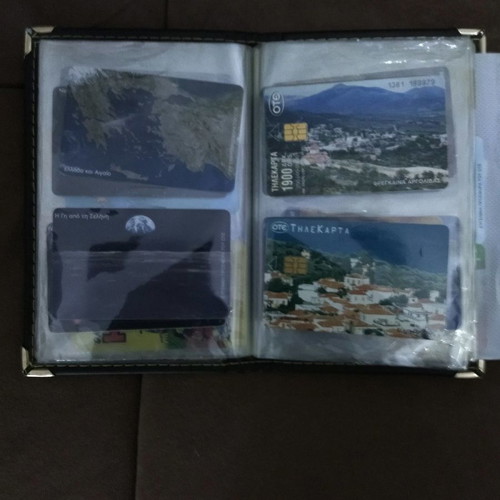 Collectible phone cards used with album