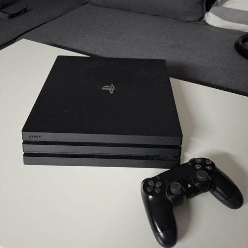 PlayStation 4 Pro 500 GB SSD used with power and HDMI cables