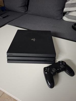 PlayStation 4 Pro 500 GB SSD used with power and HDMI cables