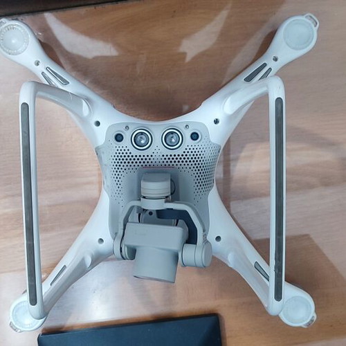 DJI Phantom 4 drone with accessories (no working batteries)