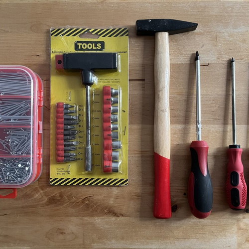 Tool set used with hammer, screwdrivers and nails