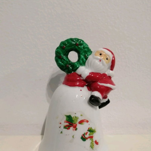 Ceramic bell like new with Santa Claus and wreath