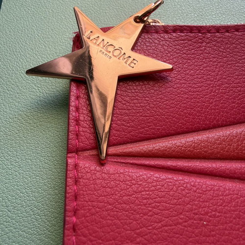 Lancôme toiletry bag like new, fuchsia with pink-gold star charm