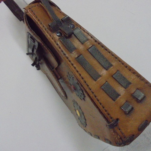 Vintage leather handbag with decorative ornaments, used, brown