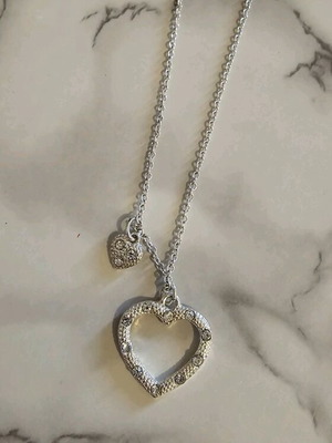 Heart necklace with rhinestones like new, silver color