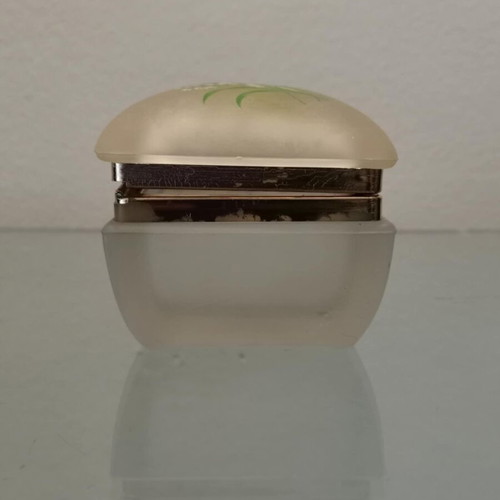 Glass vintage jewelry box used with floral decoration on lid