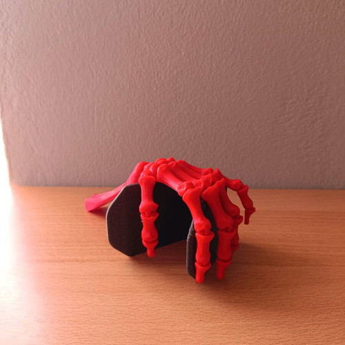 Articulated hand new, 3D printed, red PLA