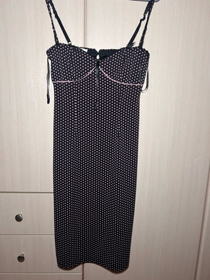 Dress like new with pink dots and black lace neckline detail