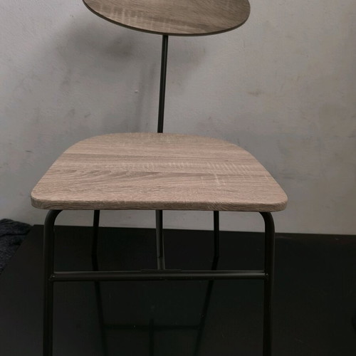 Four chairs with nice design like new, black with wooden seat