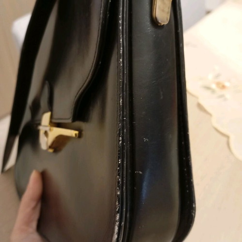 Black leather shoulder bag used with minimal wear